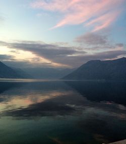 Scenic view of lake against sky during sunset