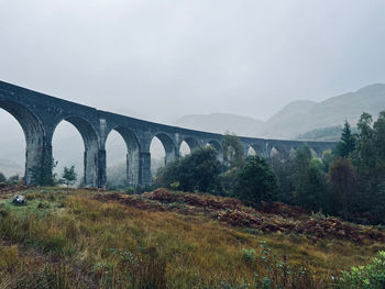 Viaduct against mountains