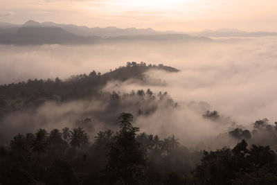 Scenic view of mountains against sky during sunset