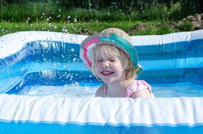 Portrait of girl in pool