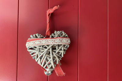 Close-up of love hanging on wall