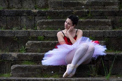 Classic tutu, simple pose of a ballerina with a lot of naturalness and elegance.