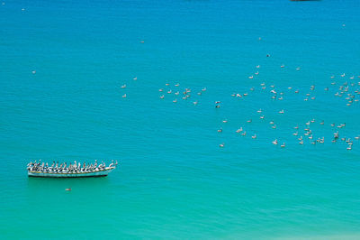 High angle view of ship sailing in sea