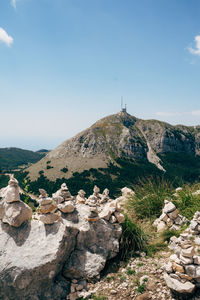 Rocks on mountain against clear sky