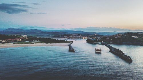 Scenic view of sea against sky at dusk