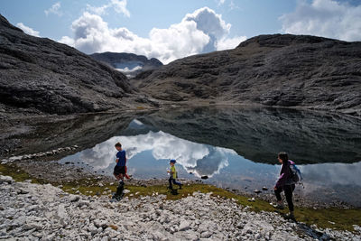 Sunny day on dolomites, hiking in summer through altopiano della rosetta