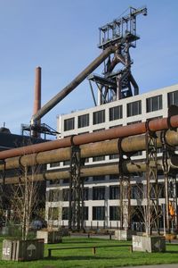 View of abandoned factory against clear sky