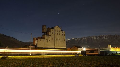 Light trail against sky at night