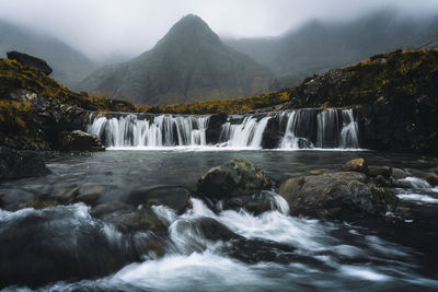 Scenic view of waterfall in forest