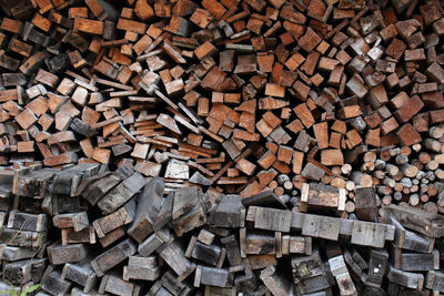 Full frame shot of logs in forest