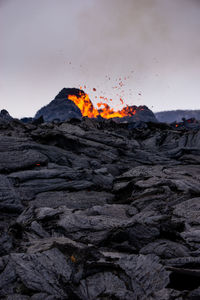 Scenic view of volcanic mountain against sky