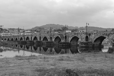 Bridge over river against sky