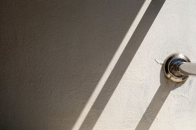 High angle view of shadow on wall