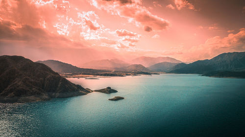 Aerial view of lake against sky during sunset