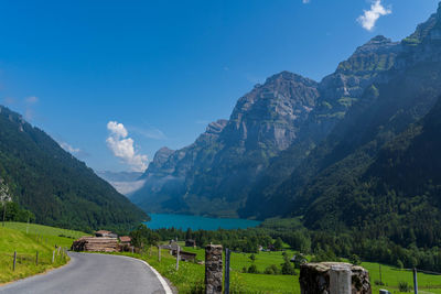 Panoramic view of road amidst mountains against sky