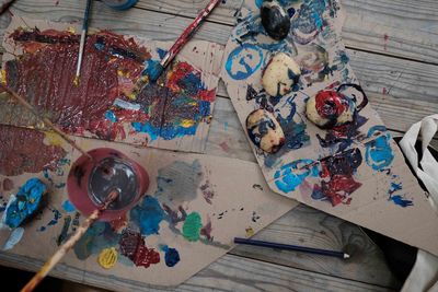 High angle view of paintbrushes on table