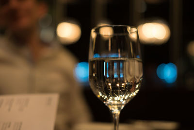 Close-up of wine bottles on table