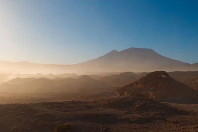 Scenic view of mountains against clear sky