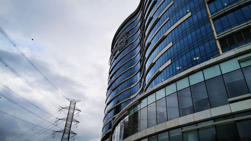 Low angle view of modern building against sky