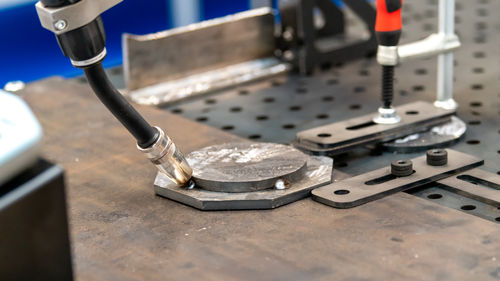 Close-up of equipment on table