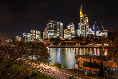 Illuminated buildings in city at night