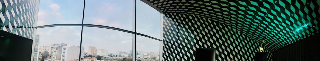 Low angle view of modern buildings against sky