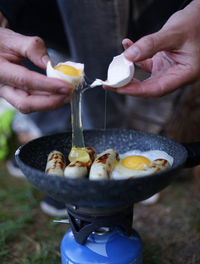 Midsection of person preparing food