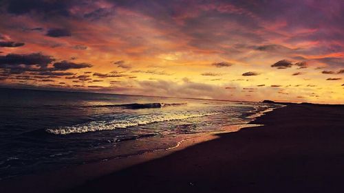 Scenic view of sea at sunset