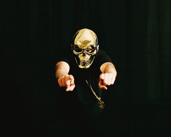 High angle view of person wearing black mask