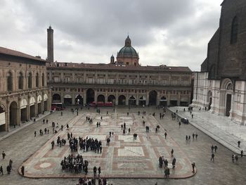 Group of people in front of historical building