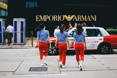 Woman looking at city street