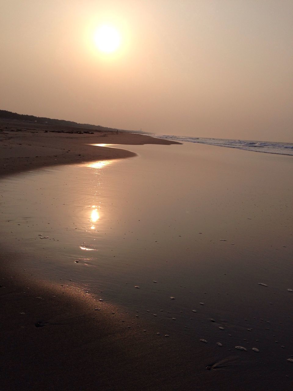 sea, sunset, sun, water, beach, horizon over water, tranquil scene, scenics, tranquility, beauty in nature, shore, reflection, nature, idyllic, sand, sky, sunlight, orange color, clear sky, coastline