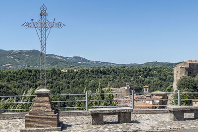 Scenic view of mountains against clear blue sky