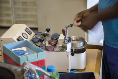 Midsection of man preparing food at home