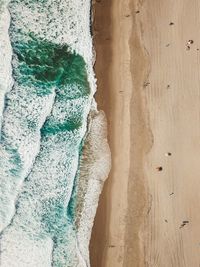 High angle view of sand on beach