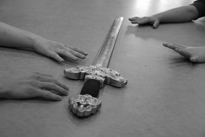 High angle view of people playing on table