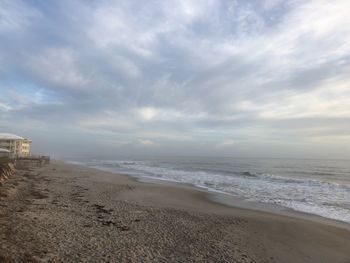 Scenic view of beach against sky