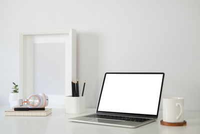 Interior of laptop on table at home