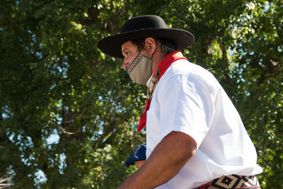 Portrait of argentinian gaucho wearing face mask