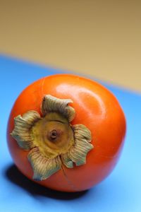 Close-up of orange fruit on table