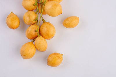 Close-up of fruits on white background