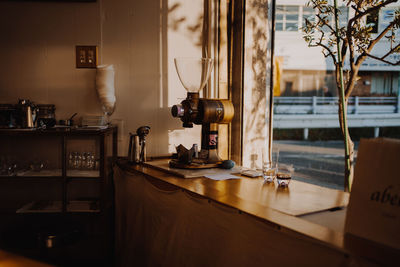 View of coffee machine on table at cafe