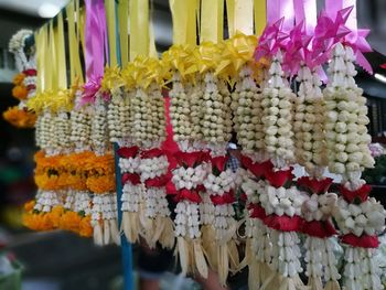 Close-up of flowers hanging at market stall