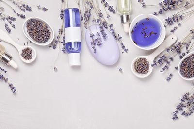 High angle view of lavender beauty products on table