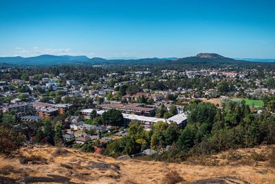 Aerial view of town against clear sky