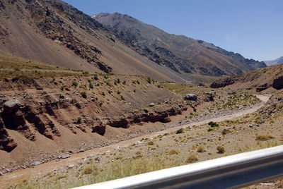 Scenic view of landscape and mountains against sky