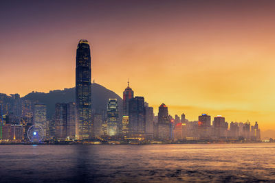 View of buildings against sky during sunset