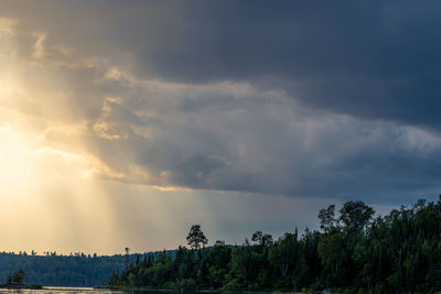 Scenic view of rainbow against sky during sunset