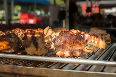 Close-up of meat on barbecue grill