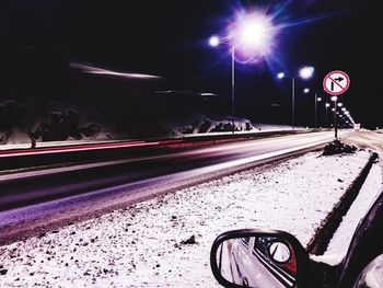 Cars on road at night